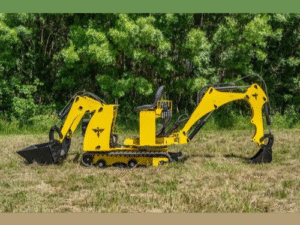 Tractopelle Phoenix 280 en action sur un chantier