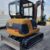 Mini pelle Caterpillar 302.5 occasion révisée avec 4 godets Mini pelle Caterpillar 302.5 occasion révisée avec 4 godets
